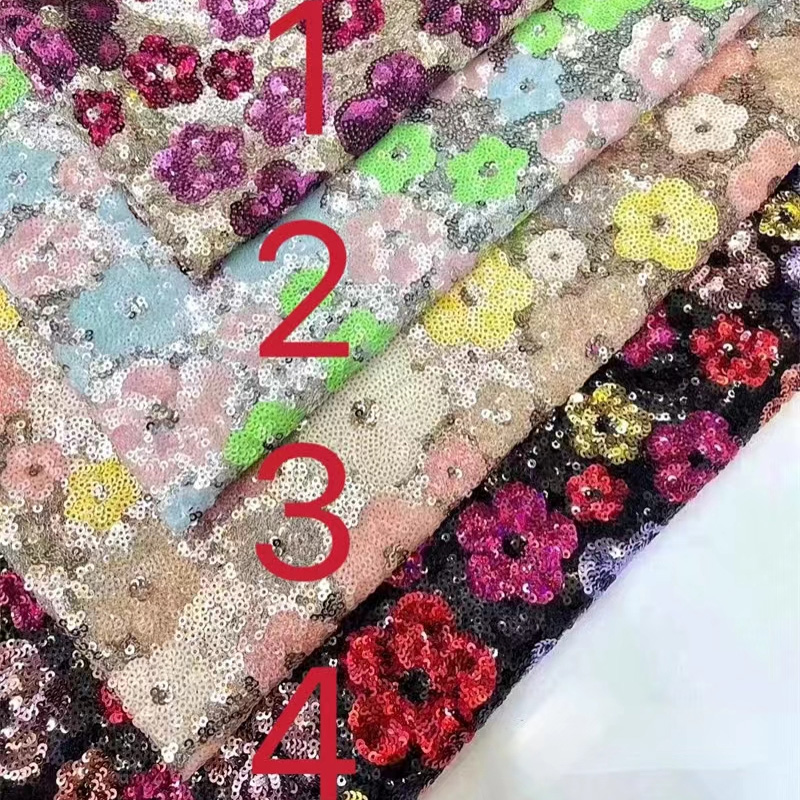 Lace Groothandel onthult nieuwe paillettenstof voor meisjes- en vrouwelijke kledingkostuums